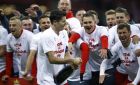 Poland's Robert Lewandowski and his team mates celebrate after winning the Euro 2016 group D qualification soccer match against Republic of Ireland in Warsaw, Poland October 11, 2015.  Poland won the match 2-1 to secure a place for Euro 2016.     REUTERS/Kacper Pempel   - RTS40R0