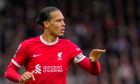 Liverpool's Virgil van Dijk runs during the English Premier League soccer match between Fulham and Liverpool at Craven Cottage stadium in London, Sunday, April 21, 2024. (AP Photo/Kirsty Wigglesworth)