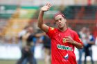 Brazil soccer star Ronaldinho, wearing the jersey of the Guatemalan club Municipal, waves to the public prior to a friendly soccer match against Comunicaciones in Guatemala City, Sunday, July 10, 2016. Ronaldinho played one half with each team. (AP Photo/Moises Castillo)