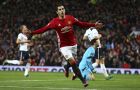 Manchester United's Henrikh Mkhitaryan celebrates scoring the first goal during the English Premier League soccer match between Manchester United and Tottenham Hotspur at Old Trafford in Manchester, England, Sunday, Dec. 11, 2016. (AP Photo/Dave Thompson)