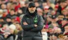 Liverpool's manager Jurgen Klopp stands during the English Premier League soccer match between Liverpool and Chelsea, at Anfield Stadium, Liverpool, England, Wednesday, Jan.31, 2024. (AP Photo/Jon Super)