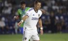 LA Galaxy forward Javier Hernández signals to a teammate during the first half of an MLS soccer match against the Seattle Sounders Friday, Aug. 19, 2022, in Carson, Calif. The match ended in a tie 3-3. (AP Photo/Raul Romero Jr.)