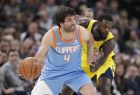 Indiana Pacers guard Lance Stephenson (1) defends Los Angeles Clippers guard Milos Teodosic (4) during the second half of an NBA basketball game in Indianapolis, Friday, March 23, 2018. The Pacers defeated the Clippers 109-104. (AP Photo/Michael Conroy)