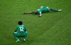 FORTALEZA, BRAZIL - JUNE 24: A dejected Wilfried Bony (L) and Die Serey of the Ivory Coast react after being defeated by Greece 2-1 during the 2014 FIFA World Cup Brazil Group C match between Greece and the Ivory Coast at Castelao on June 24, 2014 in Fortaleza, Brazil.  (Photo by Robert Cianflone/Getty Images)