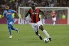 Nice's Mario Balotelli, right, controls the ball ball during a Champions League playoff round, second leg soccer match between Nice and Napoli in Nice, France, Tuesday, Aug. 22, 2017. (AP Photo/Claude Paris)