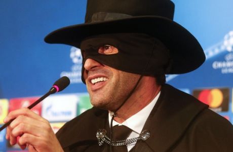 Shakthtar coach Paulo Fonseca, dressed as fictional character Zorro attends a press conference after victory his team in the Champions League group F soccer match between Manchester City and Shakhtar Donetsk at the Metalist Stadium in Kharkiv, Ukraine, Wednesday, Dec. 6, 2017. (AP Photo/Efrem Lukatsky)