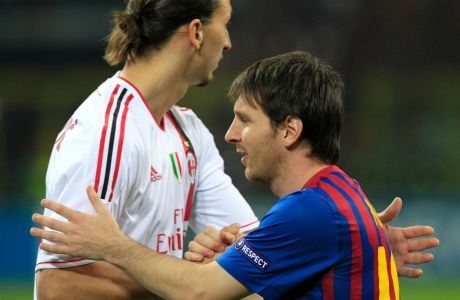 AC Milan forward Zlatan Ibrahimovic, of Sweden, left, hugs with Barcelona forward Lionel Messi, of Argentina, during a Champions League first leg quarterfinals soccer match, between AC Milan and Barcelona, at the San Siro stadium, in Milan, Italy, Wednesday, March, 28, 2012. (AP Photo/Luca Bruno)
