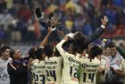 America's coach Miguel Herrera is raised by his players after defeating Cruz Azul at the final Mexico soccer league championship match at Azteca stadium in Mexico City, Sunday, Dec. 16, 2018. (AP Photo/Eduardo Verdugo)