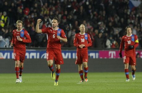 Tomas Sivok of Czech Republic (2ndL) celebrates with his teammates after he scored during the Euro 2012 play off first leg football match Czech Republic vs Montenegro on November 11, 2011 in Prague. The Cezch Republic won 2-0.   AFP PHOTO/ MICHAL CIZEK (Photo credit should read MICHAL CIZEK/AFP/Getty Images)