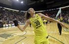 Seattle Storm's Breanna Stewart tosses a T-shirt to fans after the Storm's 85-77 win over the New York Liberty in a WNBA basketball game Friday, Aug. 17, 2018, in Seattle. (AP Photo/Elaine Thompson)