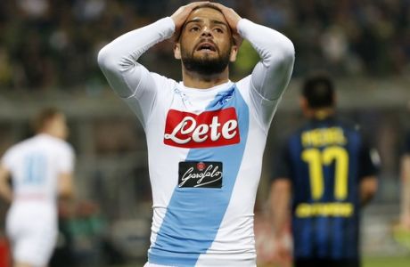 Napolis Lorenzo Insigne reacts after missing a scoring chance during the Serie A soccer match between Inter Milan and Napoli at the San Siro stadium in Milan, Italy, Sunday, April 30, 2017. (AP Photo/Antonio Calanni)