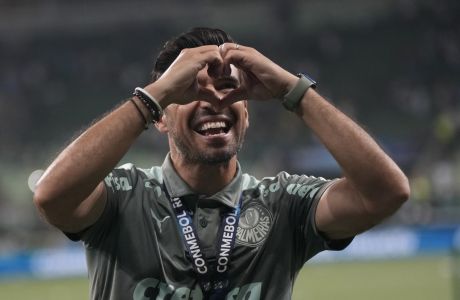 Coach Abel Ferreira of Brazil's Palmeiras celebrates after winning the Recopa Sudamericana final soccer match against Brazil's Athletico Paranaense at Allianz Parque stadium in Sao Paulo, Brazil, Wednesday, March 2, 2022. (AP Photo/Andre Penner)