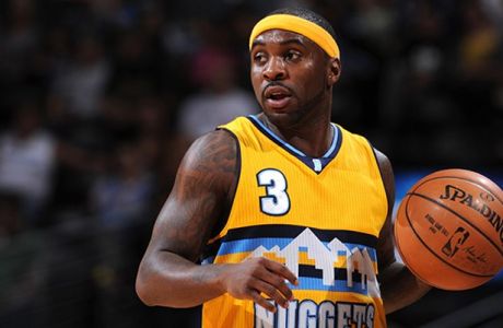 DENVER, CO - APRIL 12:  Ty Lawson #3 of the Denver Nuggets handles the ball against the Sacramento Kings on April 12, 2015 at the Pepsi Center in Denver, Colorado. NOTE TO USER: User expressly acknowledges and agrees that, by downloading and/or using this Photograph, user is consenting to the terms and conditions of the Getty Images License Agreement. Mandatory Copyright Notice: Copyright 2015 NBAE (Photo by Garrett W. Ellwood/NBAE via Getty Images)