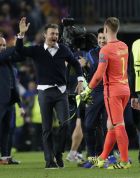 Barcelona's head coach Luis Enrique celebrates with goalkeeper Marc-Andre ter Stegen at the end of the Champions League round of 16, second leg soccer match between FC Barcelona and Paris Saint Germain at the Camp Nou stadium in Barcelona, Spain, Wednesday March 8, 2017. Barcelona won 6-1. (AP Photo/Emilio Morenatti)