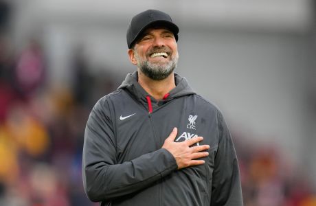 Liverpool's manager Jurgen Klopp celebrates after the English Premier League soccer match between Brentford and Liverpool at the Gtech Community Stadium in London, Saturday, Feb. 17, 2024. Liverpool won 4-1.(AP Photo/Kirsty Wigglesworth)