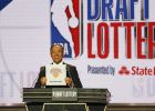 NBA Deputy Commissioner Mark Tatum announces that the New York Knicks had won the third pick during the NBA basketball draft lottery Tuesday, May 14, 2019, in Chicago. (AP Photo/Nuccio DiNuzzo)