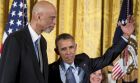 President Barack Obama, pretends to shoot an imaginary basketball over former NBA basketball player Kareem Abdul Jabbar, left, as he presents the Presidential Medal of Freedom during a ceremony in the East Room of the White House, Tuesday, Nov. 22, 2016, in Washington. Obama is recognizing 21 Americans with the nation's highest civilian award, including giants of the entertainment industry, sports legends, activists and innovators. Also pictured is Melinda Gates, background. (AP Photo/Andrew Harnik)