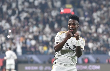 Real Madrid's Vinicius Junior celebrates after scoring at Barcelona during the Spanish Super Cup final soccer match between Real Madrid and Barcelona at Al Awwal Park Stadium in Riyadh, Saudi Arabia, Sunday, Jan. 14, 2024. (AP Photo)
