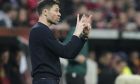 FILE - Leverkusen's head coach Xabi Alonso gestures during the Europa League semifinal second leg soccer match between Bayer Leverkusen and Roma at the BayArena in Leverkusen, Germany, Thursday, May 18, 2023.(AP Photo/Martin Meissner, File)