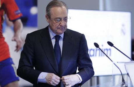 Real Madrid's President Florentino Perez looks down during the presentation of Newly signed Real Madrid soccer player Brahim Diaz at the Bernabeu stadium in Madrid, Spain, Monday, Jan. 7, 2019. Real Madrid has signed Brahim Diaz from Manchester City after the 19-year-old winger failed to get enough first-team opportunities at the Premier League champions. Madrid announced the arrival of Diaz on Sunday, saying he signed a contract until 2025. (AP Photo/Manu Fernandez)