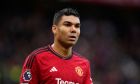 Manchester United's Casemiro walks after the first half of the English Premier League soccer match between Manchester United and Liverpool at the Old Trafford stadium in Manchester, England, Sunday, April 7, 2024. (AP Photo/Dave Thompson)