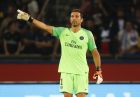 FILE - In this Sunday, Aug. 12, 2018 file photo PSG's goalkeeper Gianluigi Buffon reacts during their League One soccer match between Paris Saint-Germain and Caen at Parc des Princes stadium in Paris. (AP Photo/Michel Euler, File)
