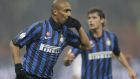 Inter Milan Brazilian defender Maicon, celebrates after scoring during the Italian Cup eight final soccer match between Inter Milan and Genoa, at the San Siro stadium in Milan, Italy, Thursday, Jan. 19, 2012. In background is seen Inter Milan midfielder Andrea Poli. (AP Photo/Luca Bruno)