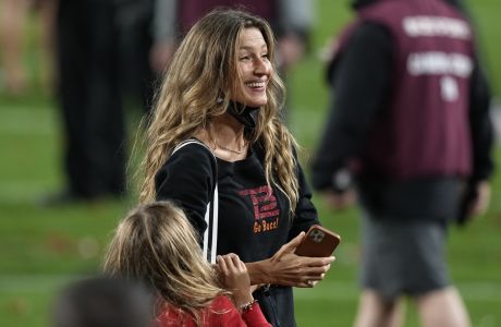 Gisele Bundchen, wife of Tampa Bay Buccaneers quarterback Tom Brady smiles after the Tampa Bay Buccaneers defeated the Kansas City Chiefs in the NFL Super Bowl 55 football game Sunday, Feb. 7, 2021, in Tampa, Fla. The Buccaneers defeated the Chiefs 31-9 to win the Super Bowl. (AP Photo/David J. Phillip)