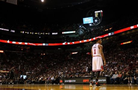 MIAMI, FL - JANUARY 29:  Derrick Rose #1 of the Chicago Bulls looks on during a game against the Miami Heat at American Airlines Arena on January 29, 2012 in Miami, Florida. NOTE TO USER: User expressly acknowledges and agrees that, by downloading and/or using this Photograph, User is consenting to the terms and conditions of the Getty Images License Agreement.  (Photo by Mike Ehrmann/Getty Images)