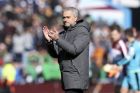 Manchester United manager Jose Mourinho applauds the fans after the English Premier League soccer match against  Burnley at Turf Moor, Burnley, England, Sunday April 23, 2017. (Martin Rickett/PA via AP)