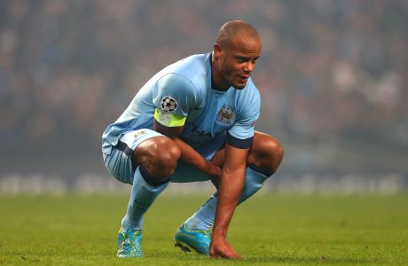 MANCHESTER, ENGLAND - NOVEMBER 05:  Vincent Kompany of Manchester City looks dejected during the UEFA Champions League Group E match between Manchester City and CSKA Moscow on November 5, 2014 in Manchester, United Kingdom.  (Photo by Alex Livesey/Getty Images)