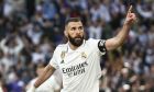 Real Madrid's Karim Benzema celebrates after scoring his side's third goal during a Spanish La Liga soccer match between Real Madrid and Valladolid at the Santiago Bernabeu stadium in Madrid, Spain, Sunday, April 2, 2023. (AP Photo/Pablo Garcia)
