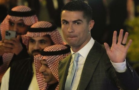 Cristiano Ronaldo attends the official unveiling as a new member of Al Nassr soccer club in in Riyadh, Saudi Arabia, Tuesday, Jan. 3, 2023. Ronaldo, who has won five Ballon d'Ors awards for the best soccer player in the world and five Champions League titles, will play outside of Europe for the first time in his storied career. (AP Photo/Amr Nabil)