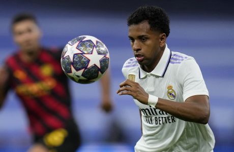 Real Madrid's Rodrygo eyes the ball during the Champions League semifinal first leg soccer match between Real Madrid and Manchester City at the Santiago Bernabeu stadium in Madrid, Spain, Tuesday, May 9, 2023. (AP Photo/Manu Fernandez)