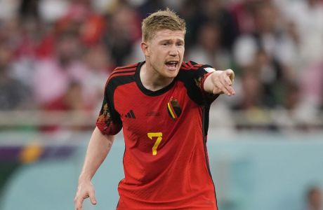 Belgium's Kevin De Bruyne yells out to teammates during the World Cup group F soccer match between Belgium and Morocco, at the Al Thumama Stadium in Doha, Qatar, Sunday, Nov. 27, 2022. (AP Photo/Frank Augstein)
