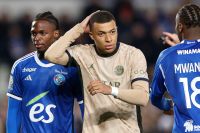 PSG's Kylian Mbappe, centre, reacts during the French League One soccer match between Strasbourg and Paris Saint-Germain at Stade de la Meinau stadium in Strasbourg, France, Friday, Feb. 2, 2024. (AP Photo/Jean-Francois Badias)