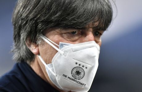 Germany head coach Joachim Low stands on the pitch prior to the start of the World Cup 2022 group J qualifying soccer match between Germany and North Macedonia in Duisburg, Germany, Wednesday, March 31, 2021. (AP Photo/Martin Meissner)