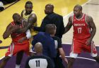 Houston Rockets' Chris Paul, left, is held back by Los Angeles Lakers' LeBron James, second from left, after Paul's fight with Lakers' Rajon Rondo during the second half of an NBA basketball game Saturday, Oct. 20, 2018, in Los Angeles. (AP Photo/Marcio Jose Sanchez)