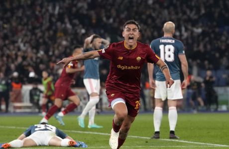 Roma's Paulo Dybala celebrates after he scores his side's second goal during the Europa League second leg quarterfinal soccer match between Roma and Feyenoord at the Olympic Stadium in Rome, Italy, Thursday, April 20, 2023. (AP Photo/Alessandra Tarantino)