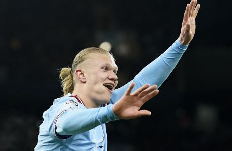 Manchester City's Erling Haaland reacts after he scored his 5th goal, the 6-0, during the Champions League round of 16 second leg soccer match between Manchester City and RB Leipzig at the Etihad stadium in Manchester, England, Tuesday, March 14, 2023. (AP Photo/Dave Thompson)