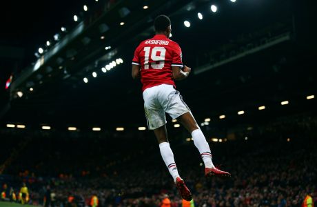Manchester United's Marcus Rashford celebrates after scoring his team second goals during the Champions League group A soccer match between Manchester United and CSKA Moscow in Manchester, England, Tuesday, Dec. 5, 2017. (AP Photo/Dave Thompson)