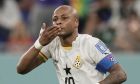 Ghana's Andre Ayew celebrates after scoring his side's first goal during the World Cup group H soccer match between Portugal and Ghana, at the Stadium 974 in Doha, Qatar, Thursday, Nov. 24, 2022. (AP Photo/Hassan Ammar)