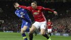 Everton's Ross Barkley, left, and Manchester United's Zlatan Ibrahimovic clash during their English Premier League soccer match between Manchester United and Everton at Old Trafford in Manchester, England, Tuesday April 4, 2017. (Martin Rickett/PA via AP)