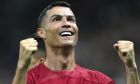 Portugal's Cristiano Ronaldo celebrates after scoring his side's opening goal during the World Cup group H soccer match between Portugal and Uruguay, at the Lusail Stadium in Lusail, Qatar, Monday, Nov. 28, 2022. (AP Photo/Themba Hadebe)