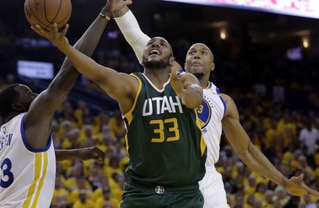 Utah Jazz's Boris Diaw (33) shoots as Golden State Warriors' Draymond Green (23) and David West, right, defend during the second half in Game 1 of an NBA basketball second-round playoff series, Tuesday, May 2, 2017, in Oakland, Calif. (AP Photo/Marcio Jose Sanchez)