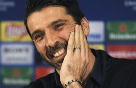 Juventus goalkeeper Gianluigi Buffon smiles during a news conference at the Dragao stadium in Porto, Portugal, Tuesday, Feb. 21, 2017. Juventus will play FC Porto in a Champions League round of 16, first leg, soccer match Wednesday. (AP Photo/Paulo Duarte)