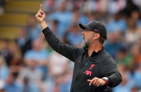 Liverpool's manager Jurgen Klopp shouts out as gives instructions from the side line during the FA Community Shield soccer match between Liverpool and Manchester City at the King Power Stadium in Leicester, England, Saturday, July 30, 2022. (AP Photo/Frank Augstein)