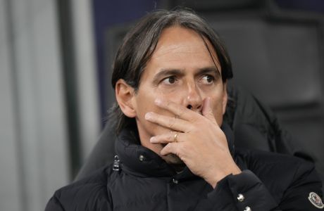 Inter Milan's head coach Simone Inzaghi waits for the start of the Champions League, round of 16, first leg soccer match between Inter Milan and Porto, at the San Siro stadium in Milan, Italy, Wednesday, Feb. 22, 2023. (AP Photo/Luca Bruno)