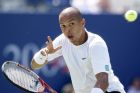 ** CORRECTS THAT ARAZI IS FROM MOROCCO NOT MADAGASCAR ** Hicham Arazi, of Morocco, hits a return against Lleyton Hewitt, of Australia, at the U.S. Open tennis tournament in New York  Friday  Sept. 3, 2004.   (AP Photo/David Duprey)