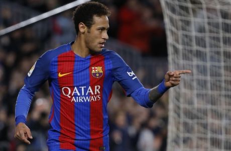 Barcelona's Neymar celebrates after scoring his side's second goal against Celta during a Spanish La Liga soccer match between Barcelona and Celta at the Camp Nou stadium in Barcelona, Saturday, March 4, 2017. Neymar scored once in Barcelona's 5-0 victory. (AP Photo/Francisco Seco)